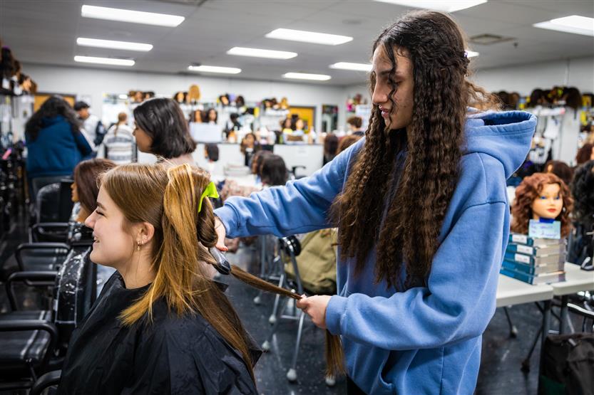 Centennial High students in the cosmetology class